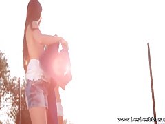 Lesbians are licking each other's nipples in the middle of the day, in a public place