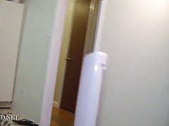 Provocative girl in purple panties is showing her nice tits and butt, while in the kitchen