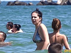 Lovely amateur girls are topless at the beach and enjoying every single second of it