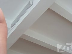 A horny voyeur is recording a nice video, while sexy girls are taking off their clothes