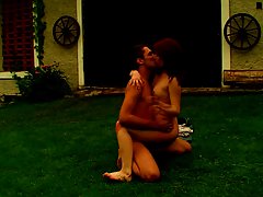 Redhead bad girl is playing a wicked game with her horny boyfriend, on the grass