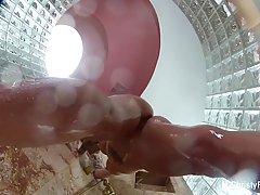 Voluptuous Christy is taking a relaxing shower in front of a hidden camera, in her friend's bathroom